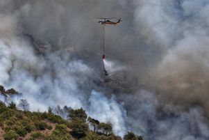 Une vue aérienne de l’incendie de forêt qui faisait rage depuis 5 jours à Lattaquié, en Syrie, le 7 juillet 2025.